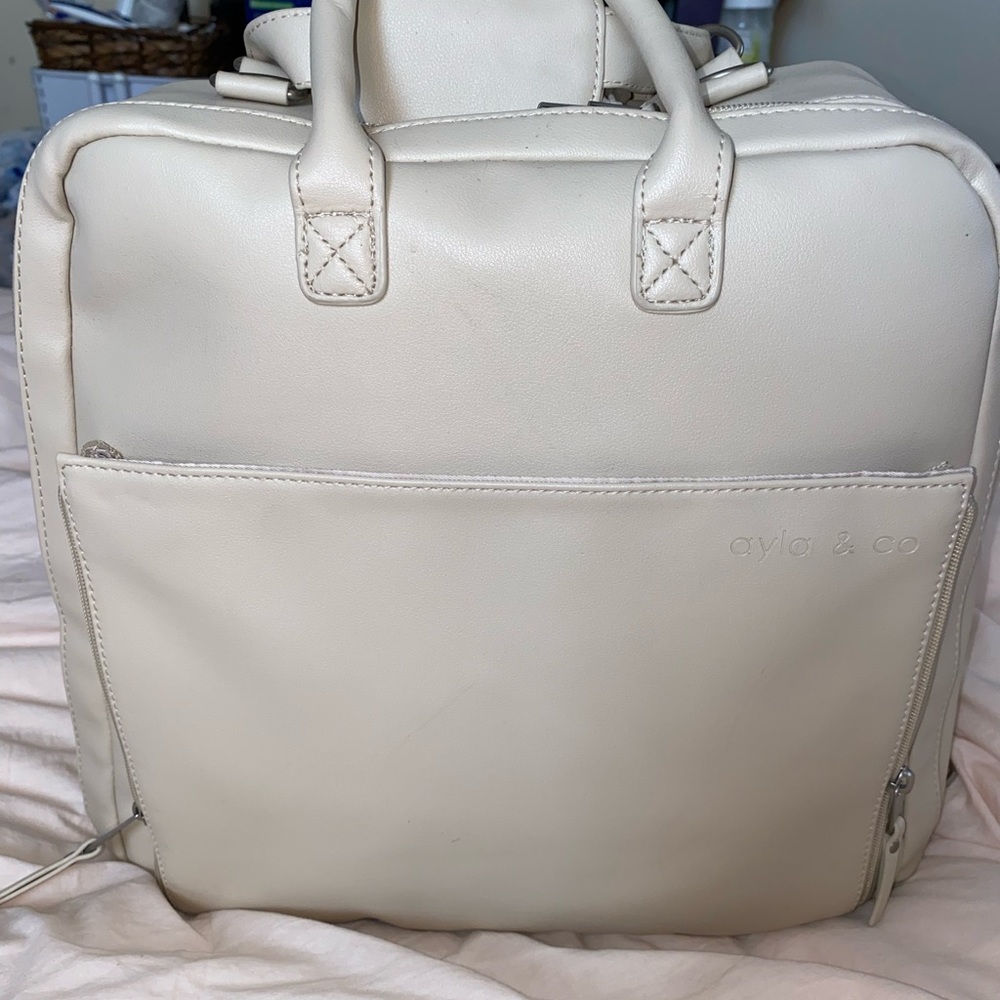New Ayla and co baby diaper bag. In ivory